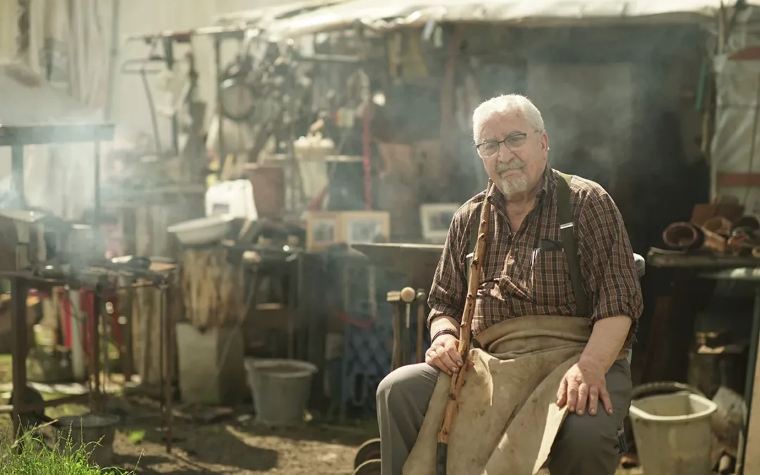 man in tool shed